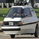 Image for article titled Finally, An Electric Car That Won't Trap You In The Zombie Holocaust